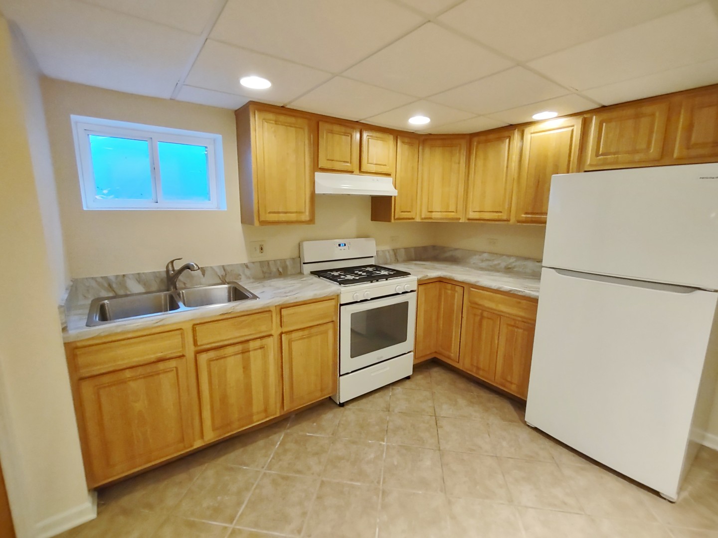 769 Halbert Lane Inverness, IL 60010 - Photo 32 of 48 a kitchen with white cabinets and white appliances