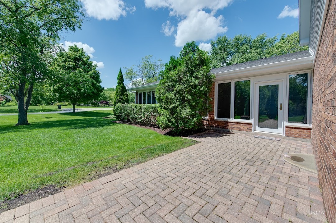 769 Halbert Lane Inverness, IL 60010 - Photo 41 of 48 a view of a house with a garden