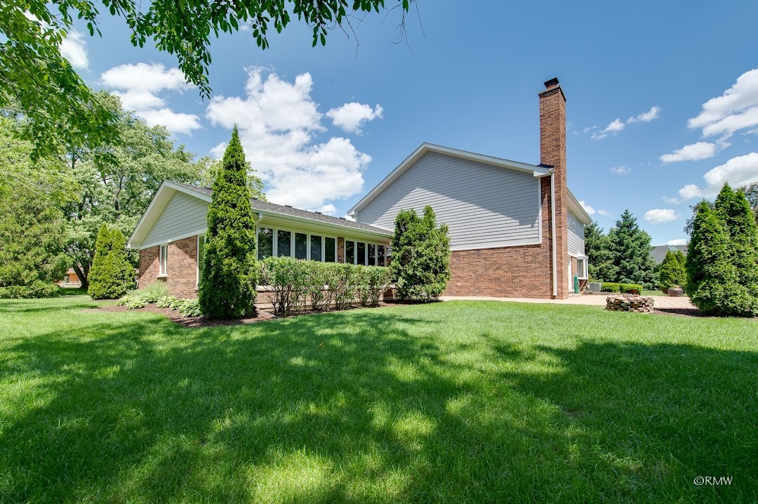 769 Halbert Lane Inverness, IL 60010 - Photo 43 of 48 a view of a house with backyard and garden