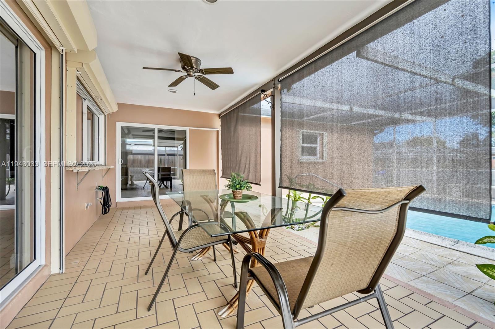 2211 North 50th Avenue Hollywood, FL 33021 - Photo 22 of 45 a view of a dining room with furniture and a window