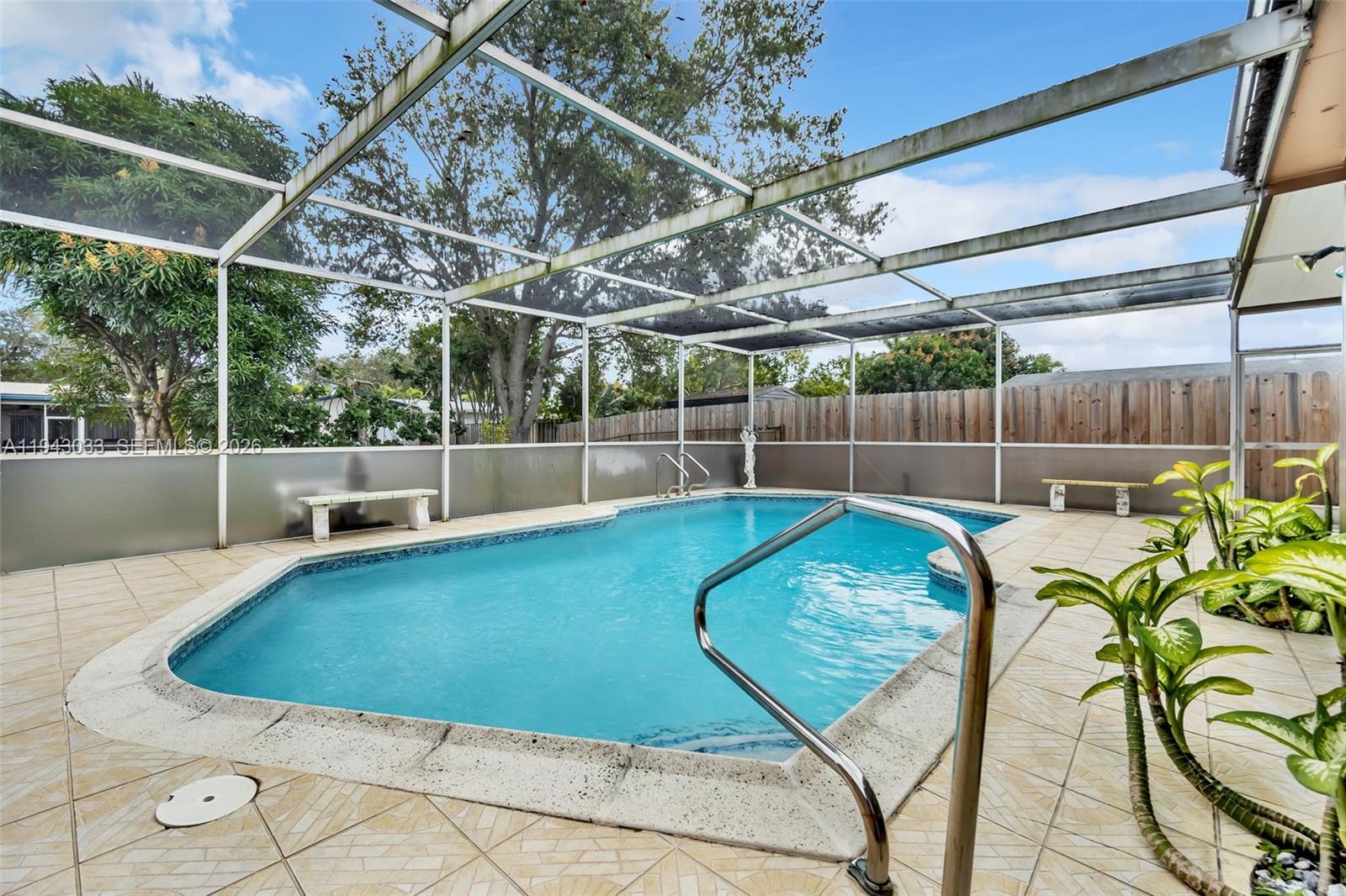 2211 North 50th Avenue Hollywood, FL 33021 - Photo 27 of 45 a view of a backyard with swimming pool