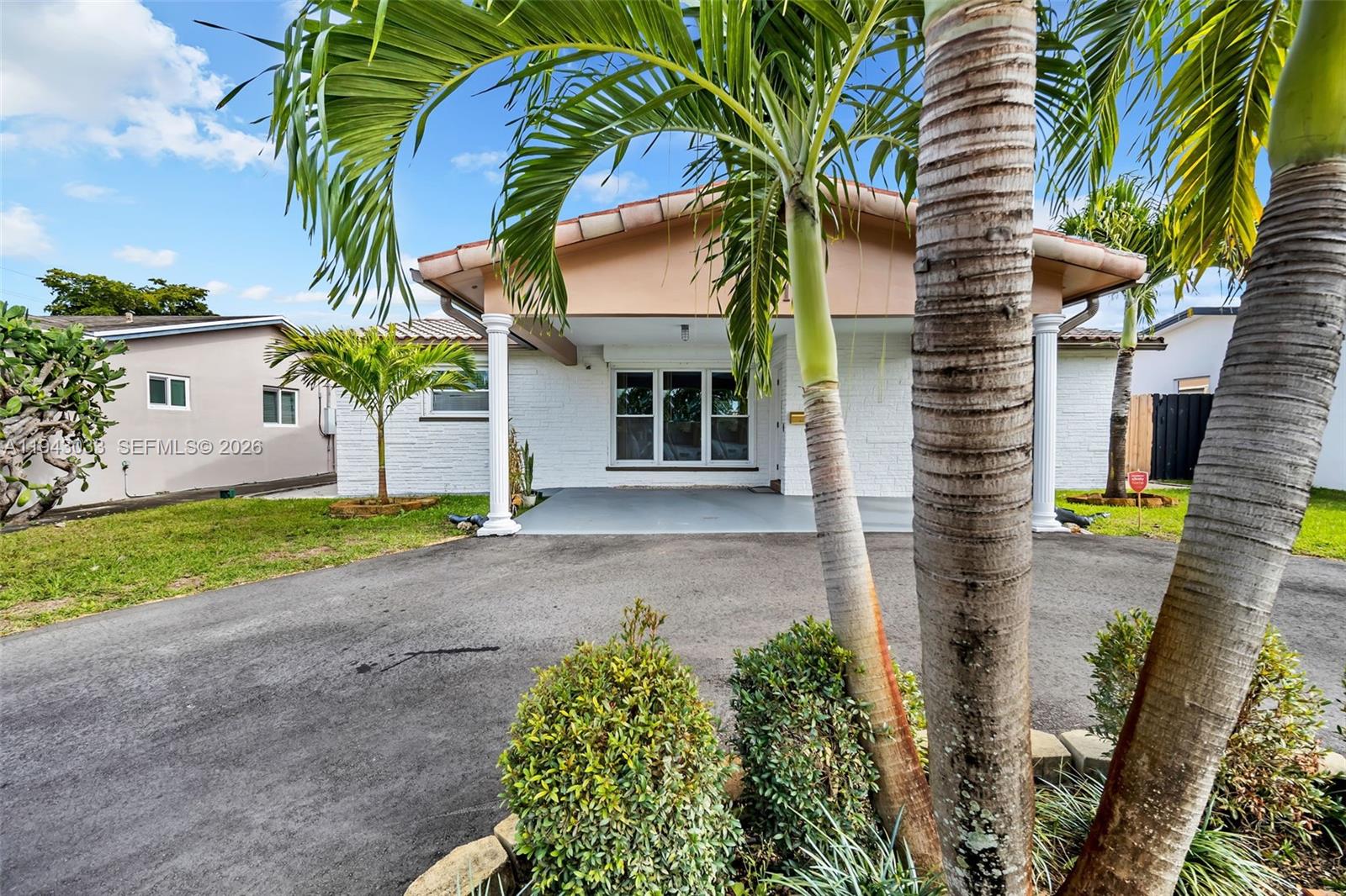 2211 North 50th Avenue Hollywood, FL 33021 - Photo 37 of 45 a view of a house with a patio