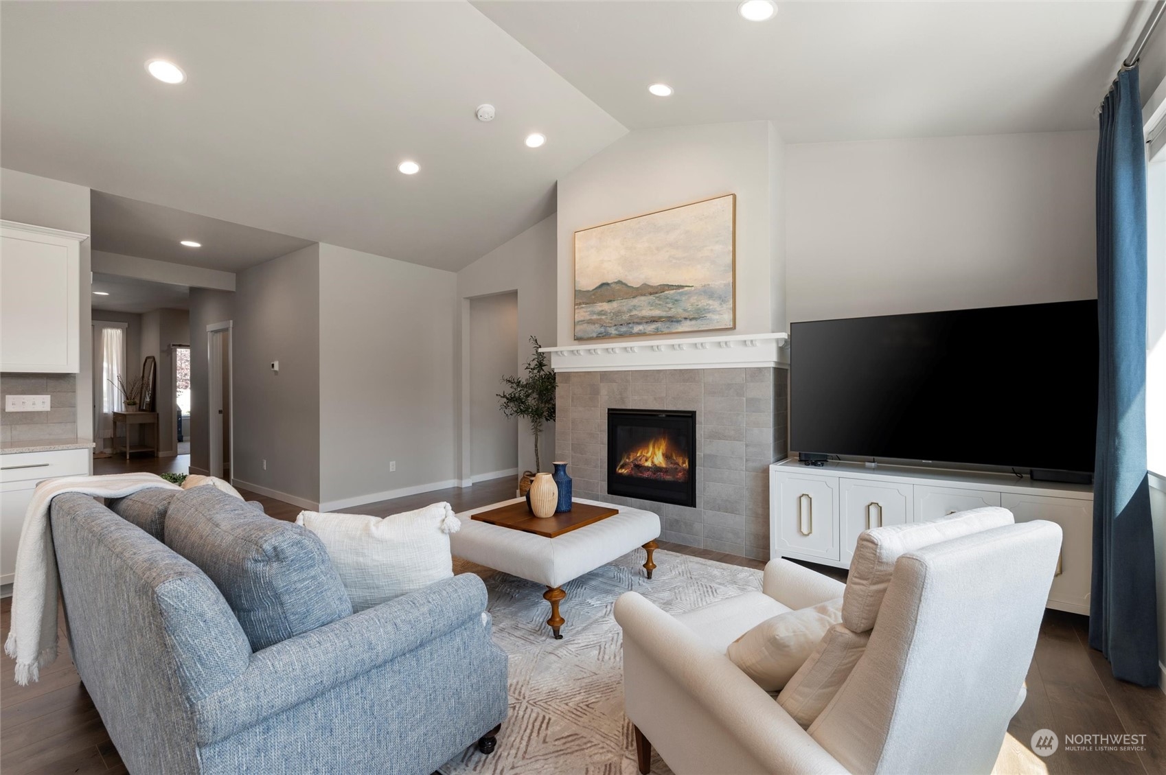 984 Rainier Loop Mount Vernon, WA 98274 - Photo 11 of 40 a living room with furniture and a flat screen tv