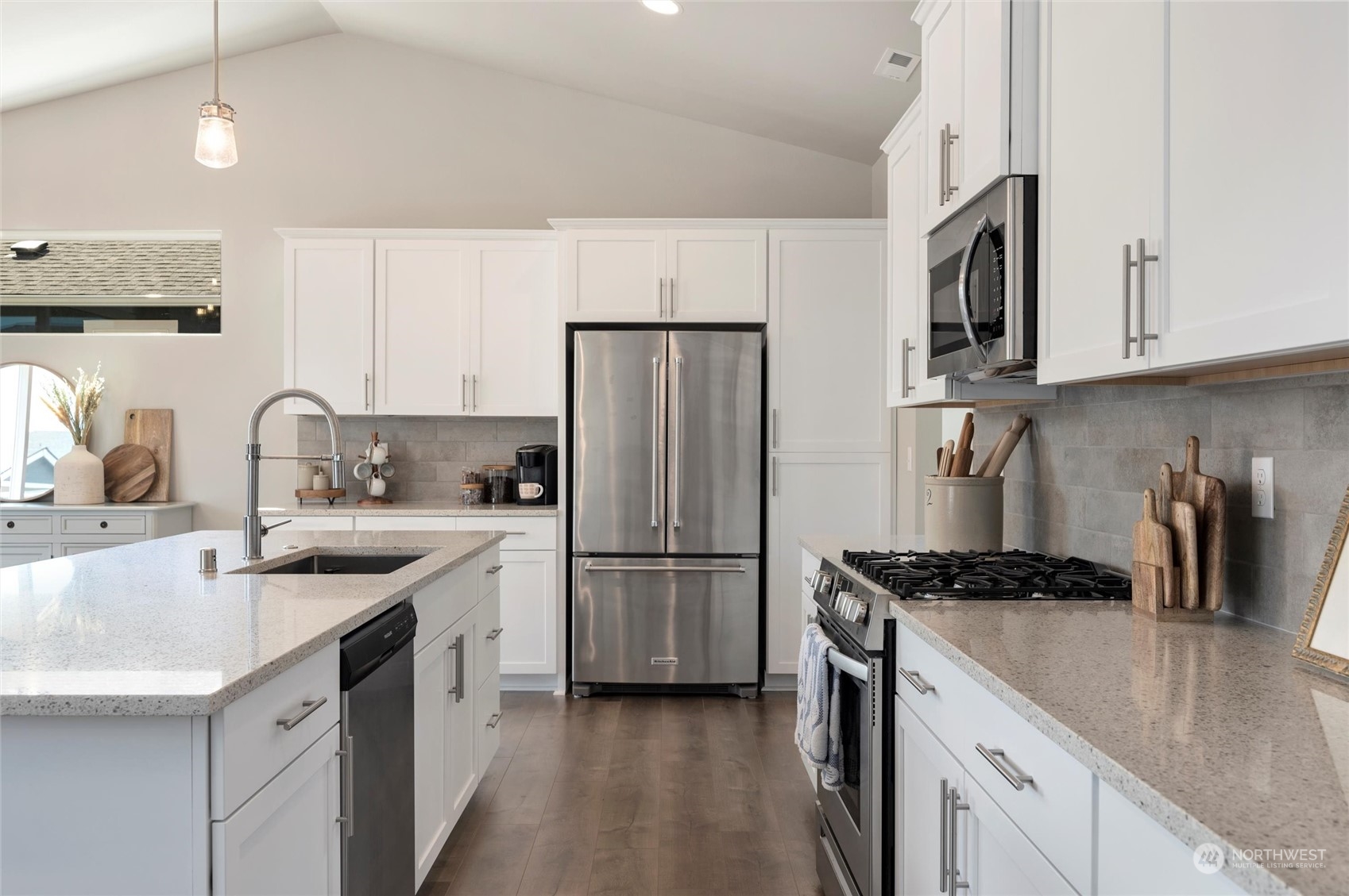 984 Rainier Loop Mount Vernon, WA 98274 - Photo 17 of 40 a kitchen with stainless steel appliances granite countertop a sink stove and refrigerator