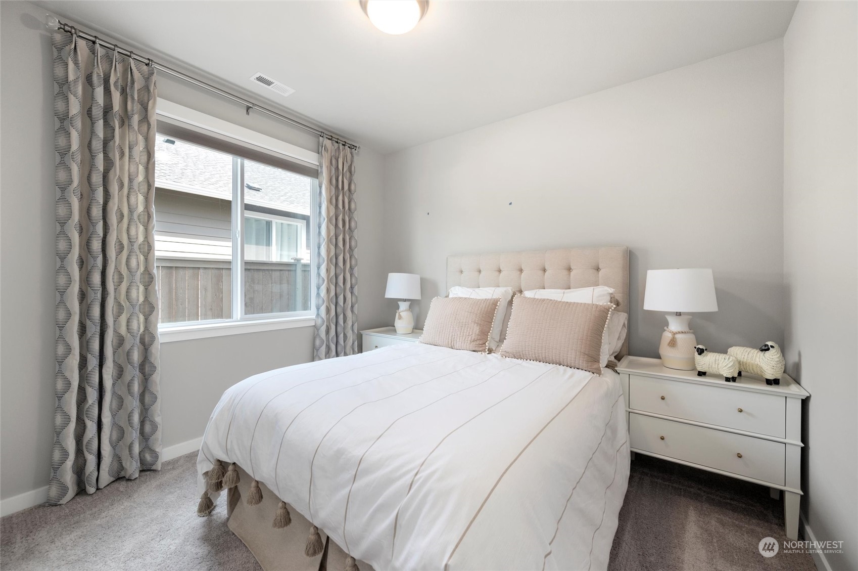 984 Rainier Loop Mount Vernon, WA 98274 - Photo 27 of 40 a bedroom with a bed and a window