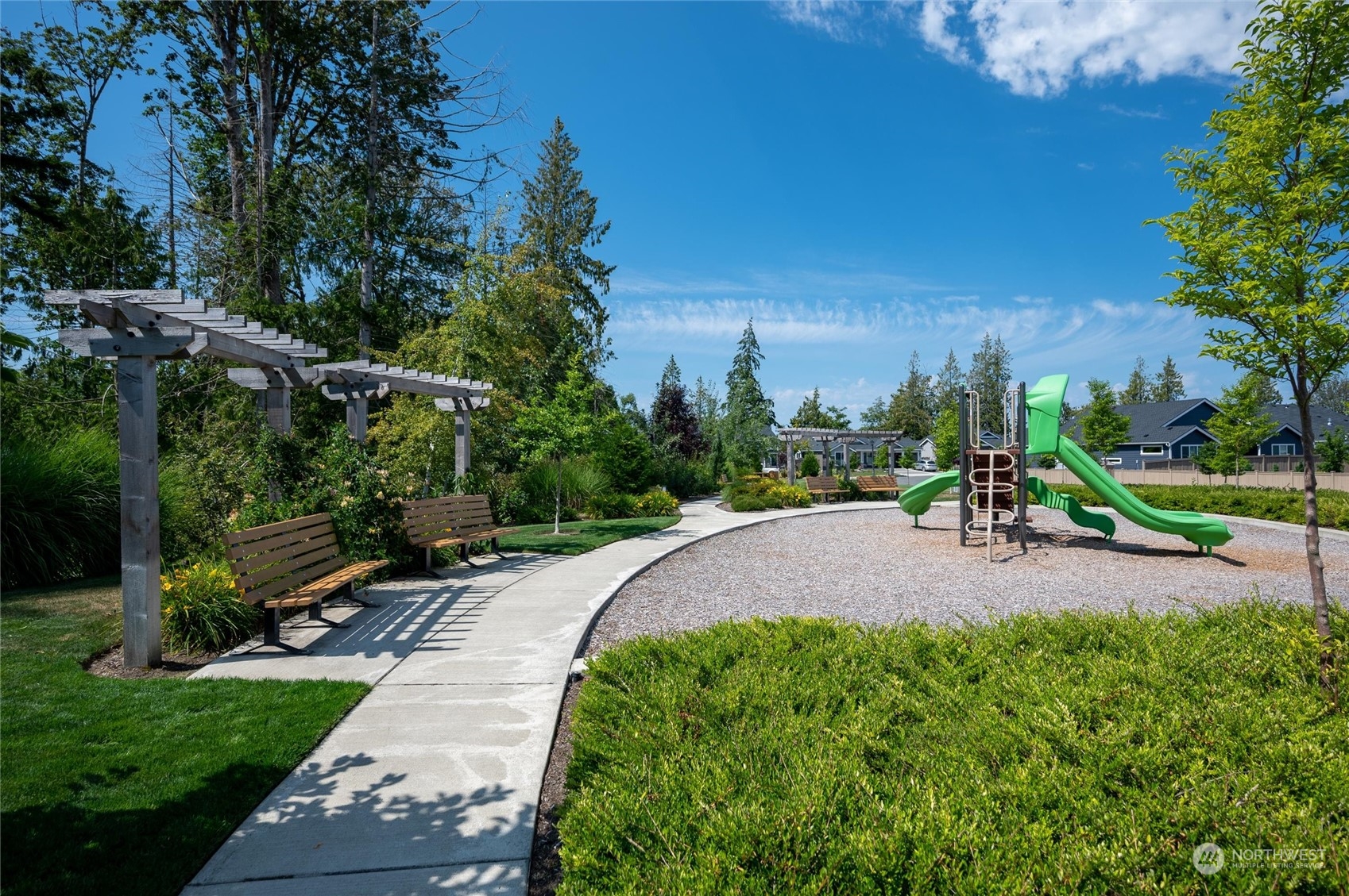 984 Rainier Loop Mount Vernon, WA 98274 - Photo 39 of 40 a childrens park with lots of green space and trees