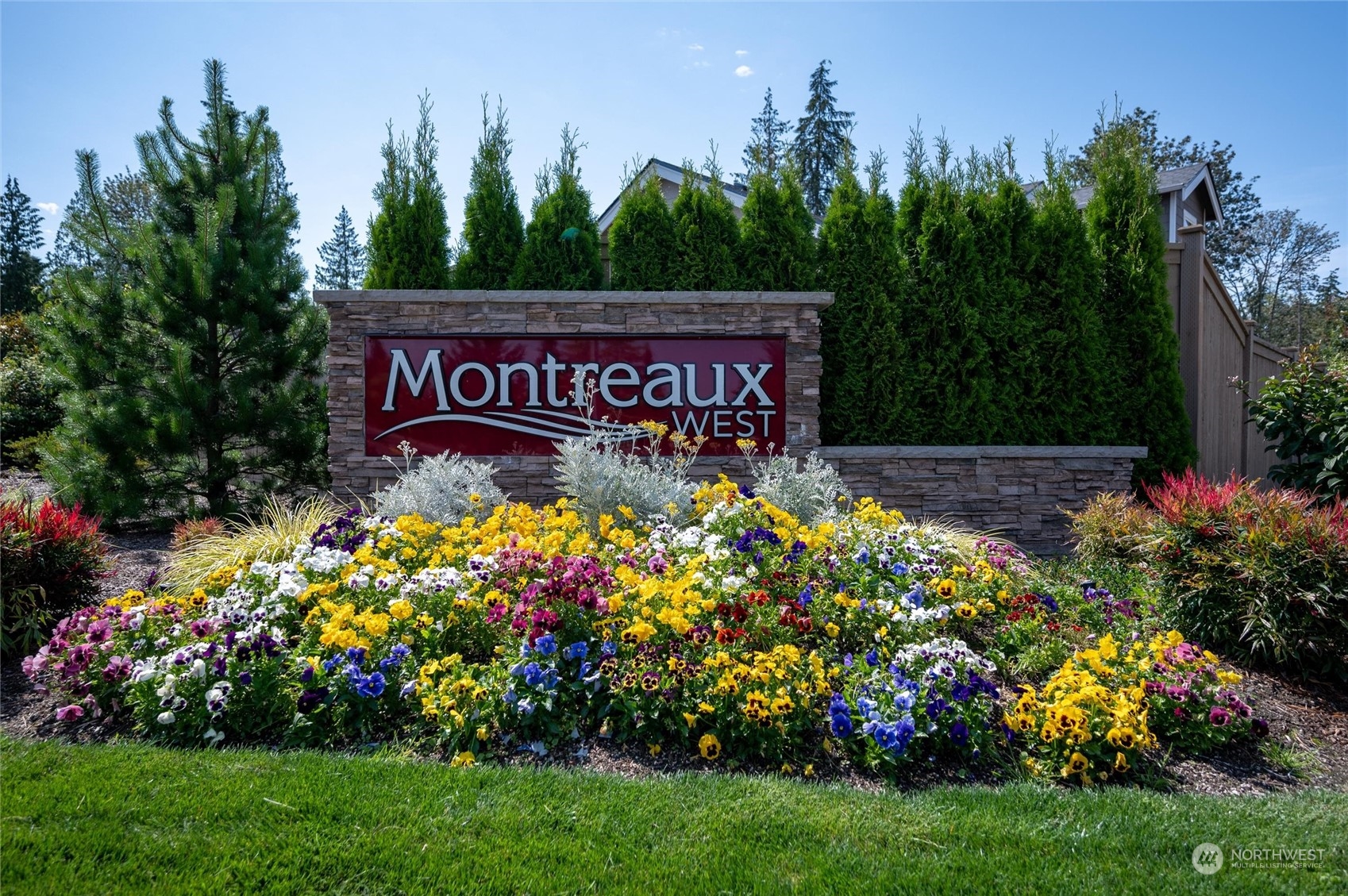 984 Rainier Loop Mount Vernon, WA 98274 - Photo 40 of 40 a view of sign board with flower around