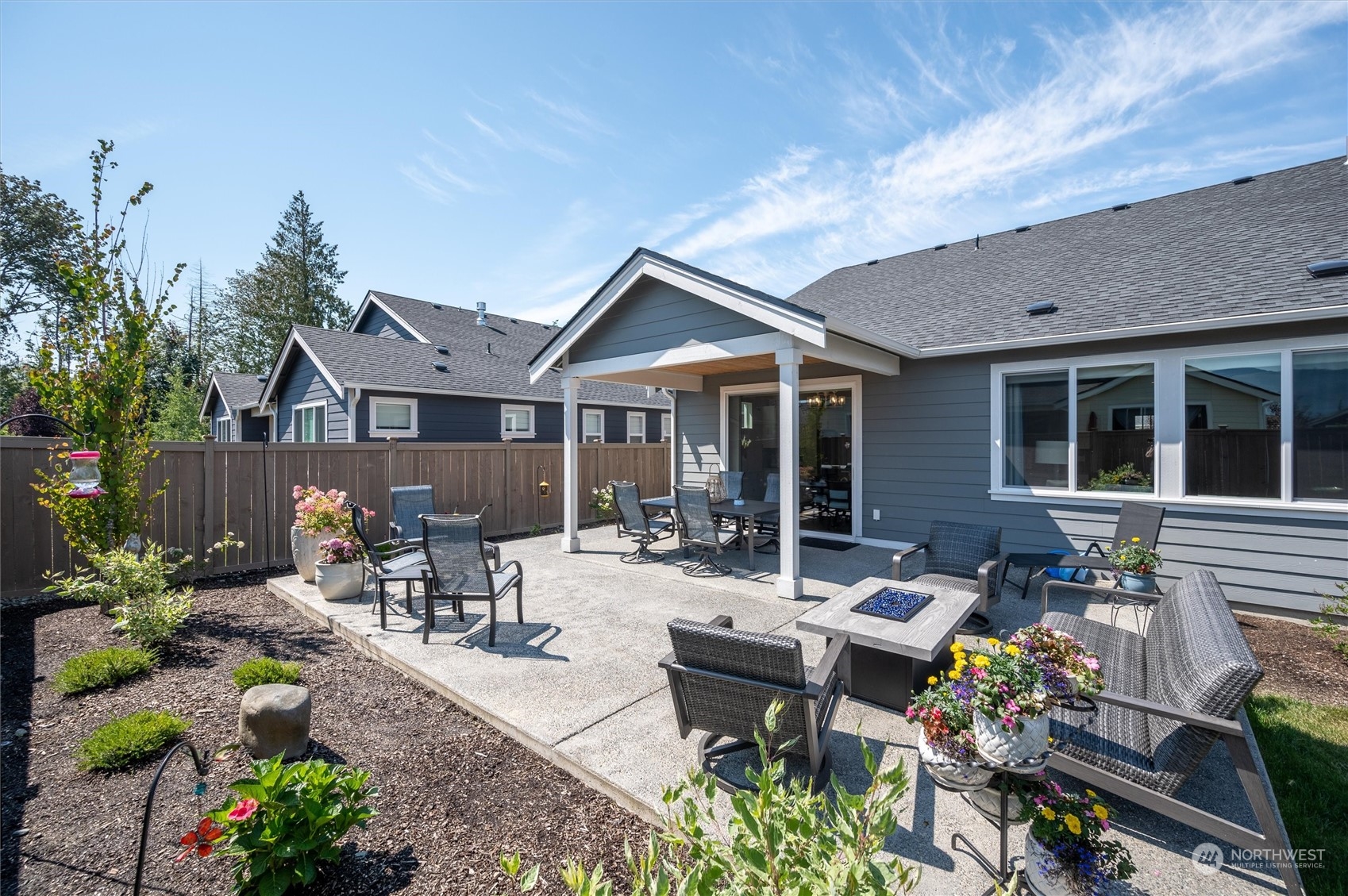 984 Rainier Loop Mount Vernon, WA 98274 - Photo 5 of 40 a view of a house with sitting area and garden