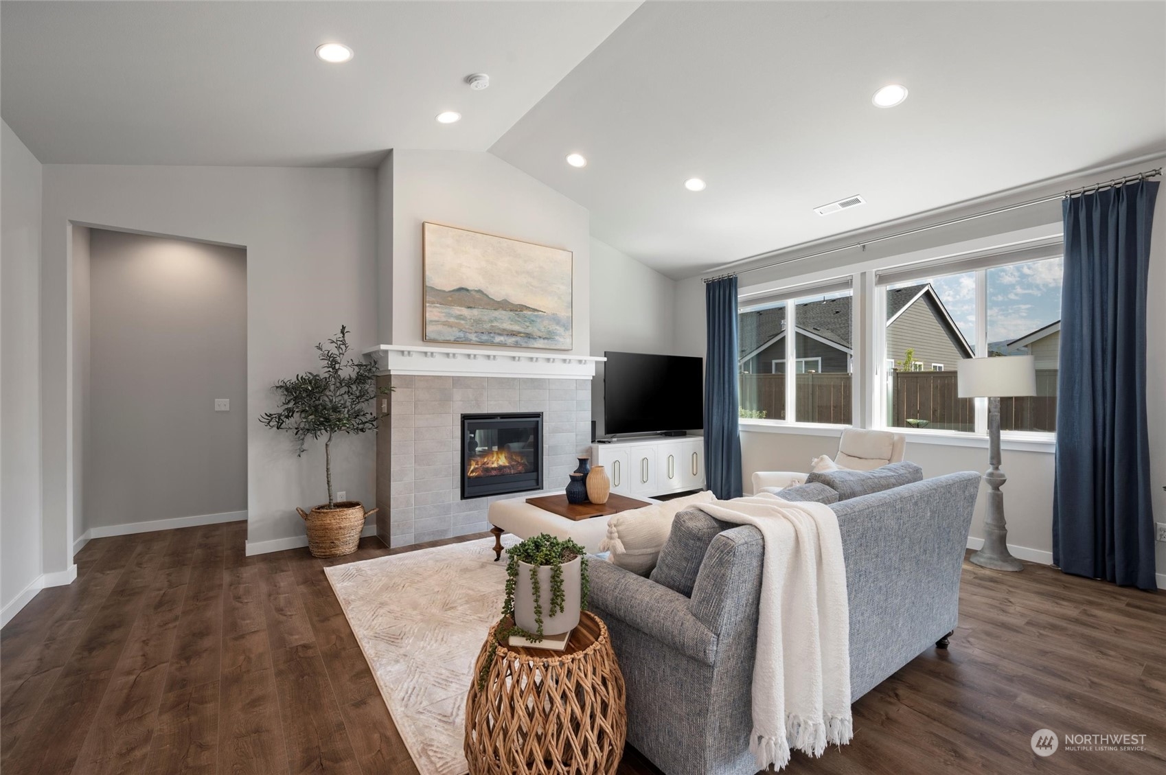 984 Rainier Loop Mount Vernon, WA 98274 - Photo 10 of 40 a living room with furniture and a fireplace