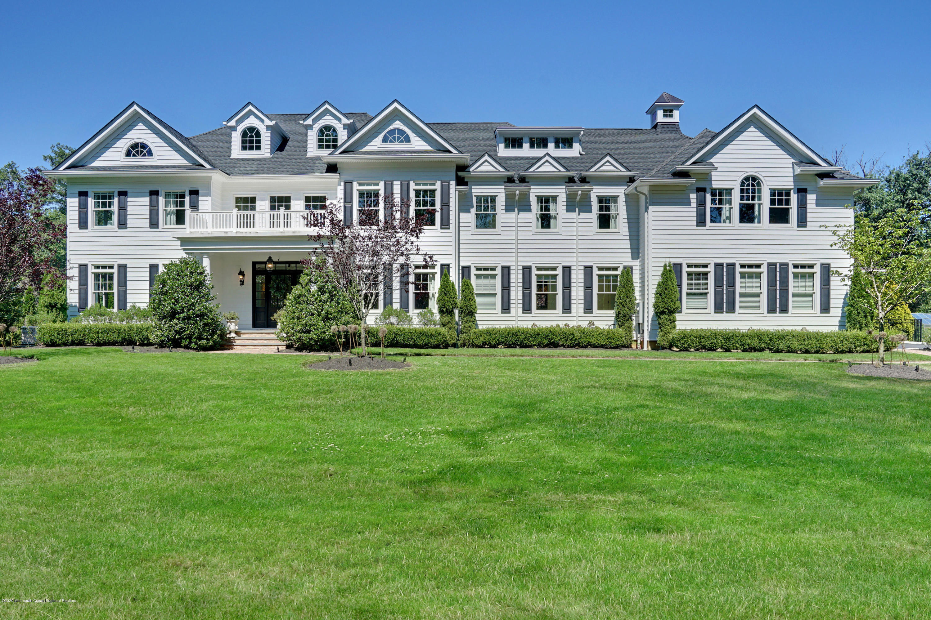 7 Heathcliff Road Rumson, NJ 07760 - Photo 1 of 61 a front view of a house with a yard