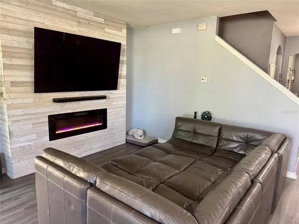 a kitchen with a stove and a microwave