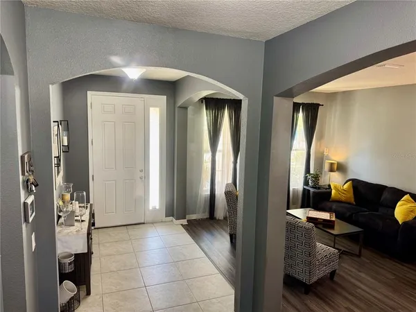 a view of livingroom with furniture and windows