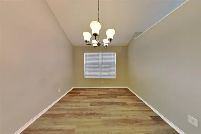a view of a chandelier in a room