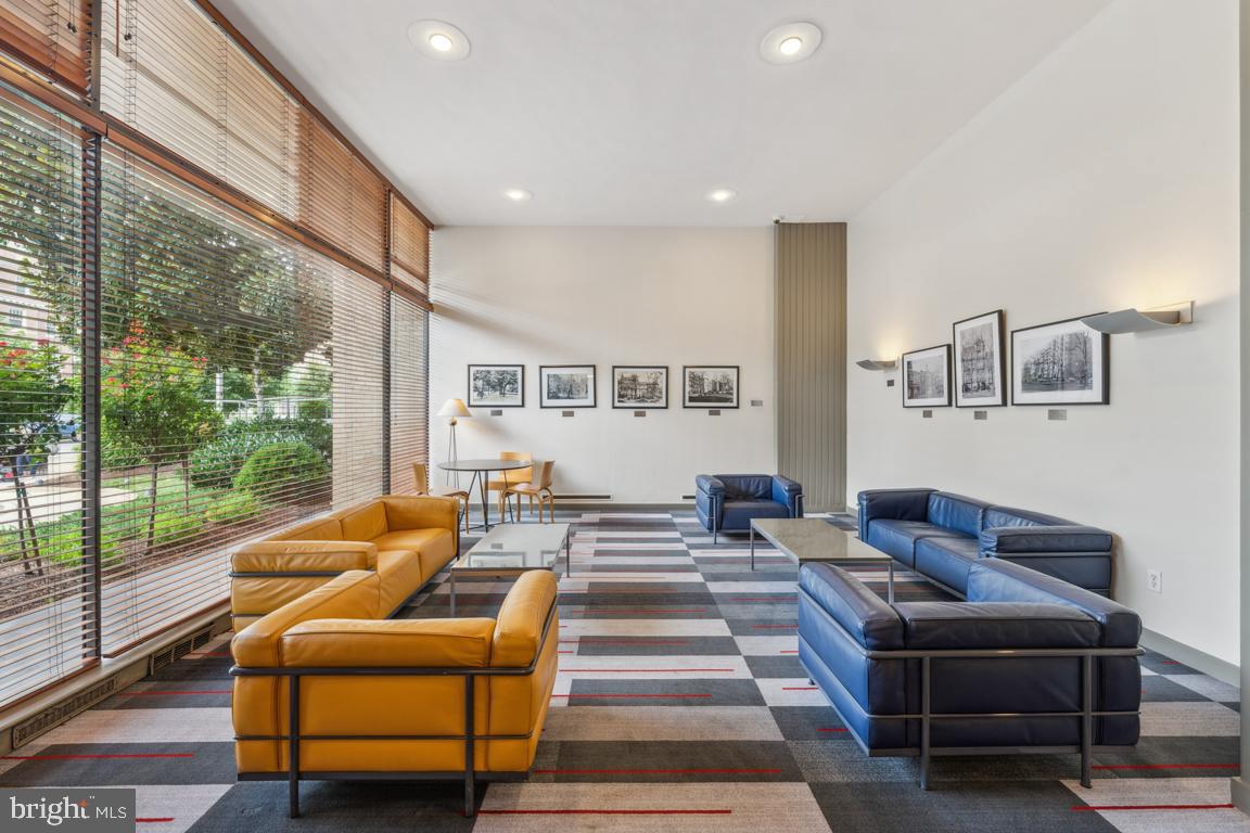 1711 Massachusetts Avenue Northwest, Unit 413 Washington, DC 20036 - Photo 18 of 20 a outdoor living space with furniture and a floor to ceiling window