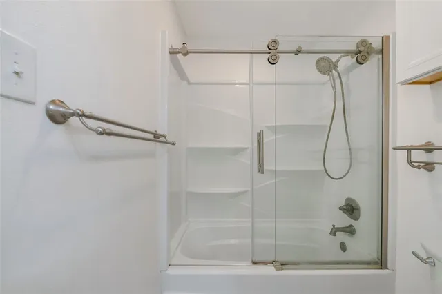 a view of a hallway with closet