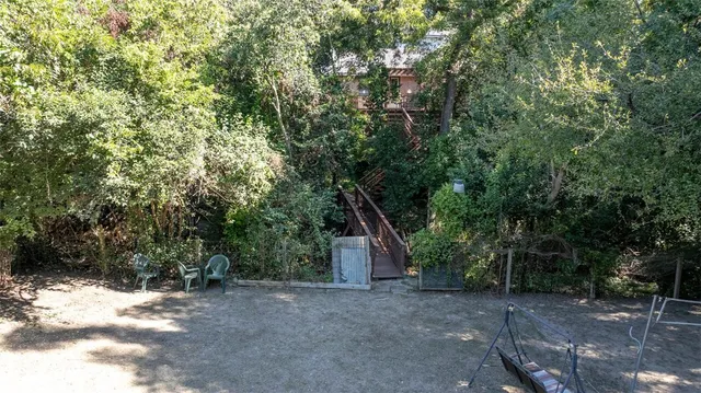 a view of a bench in the garden