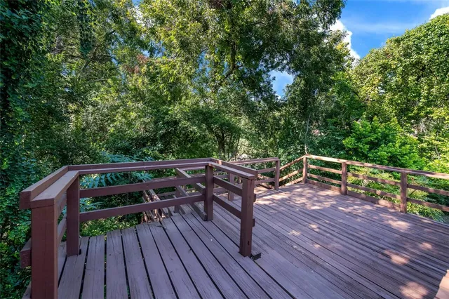 a view of a backyard with sitting area