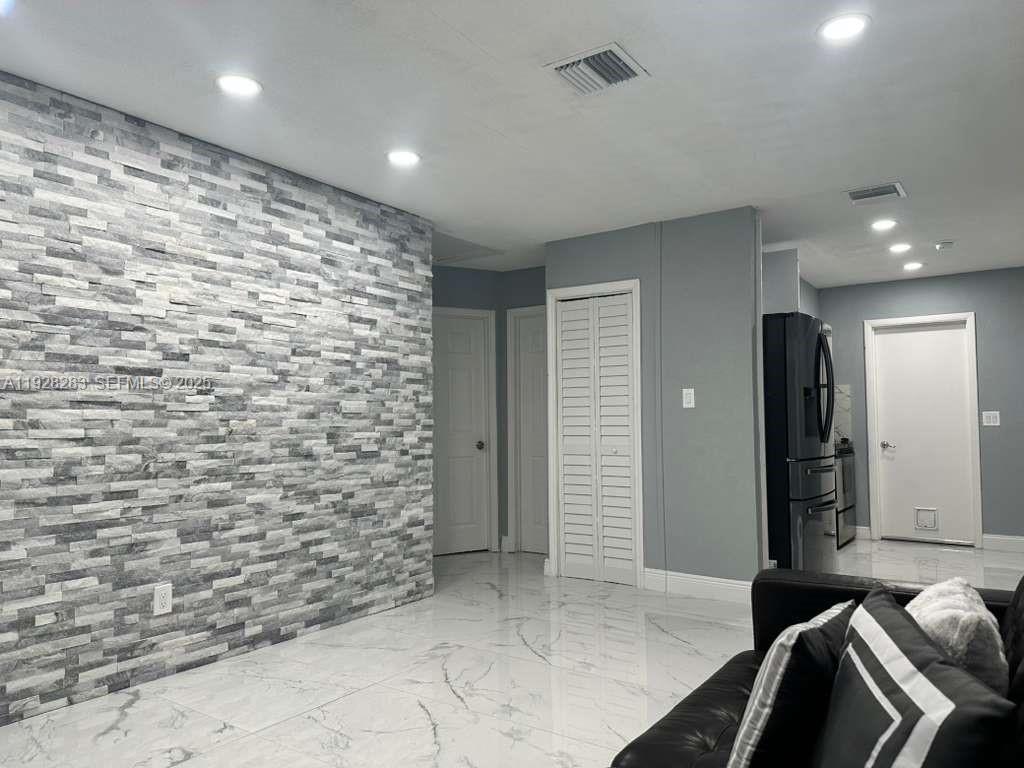 4960 Southwest 28th Terrace Dania Beach, FL 33312 - Photo 3 of 10 a view of livingroom with workspace