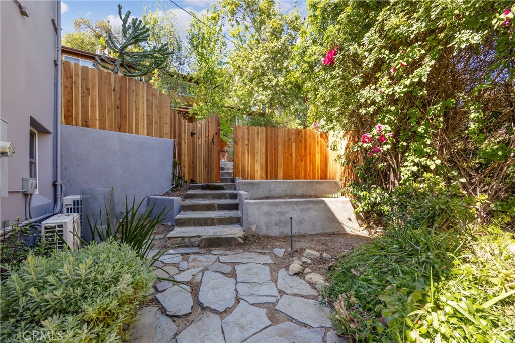 1620 Ina Drive Glendale, CA 91206 - Photo 27 of 31 a view of a pathway in front of house with wooden fence