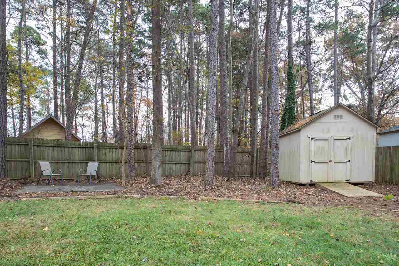 7704 Nugget Lane Raleigh, NC 27615 - Photo 10 of 18 trying to convey the size of it (with trees, natural area, multiple gathering spaces, and plenty of lawn),