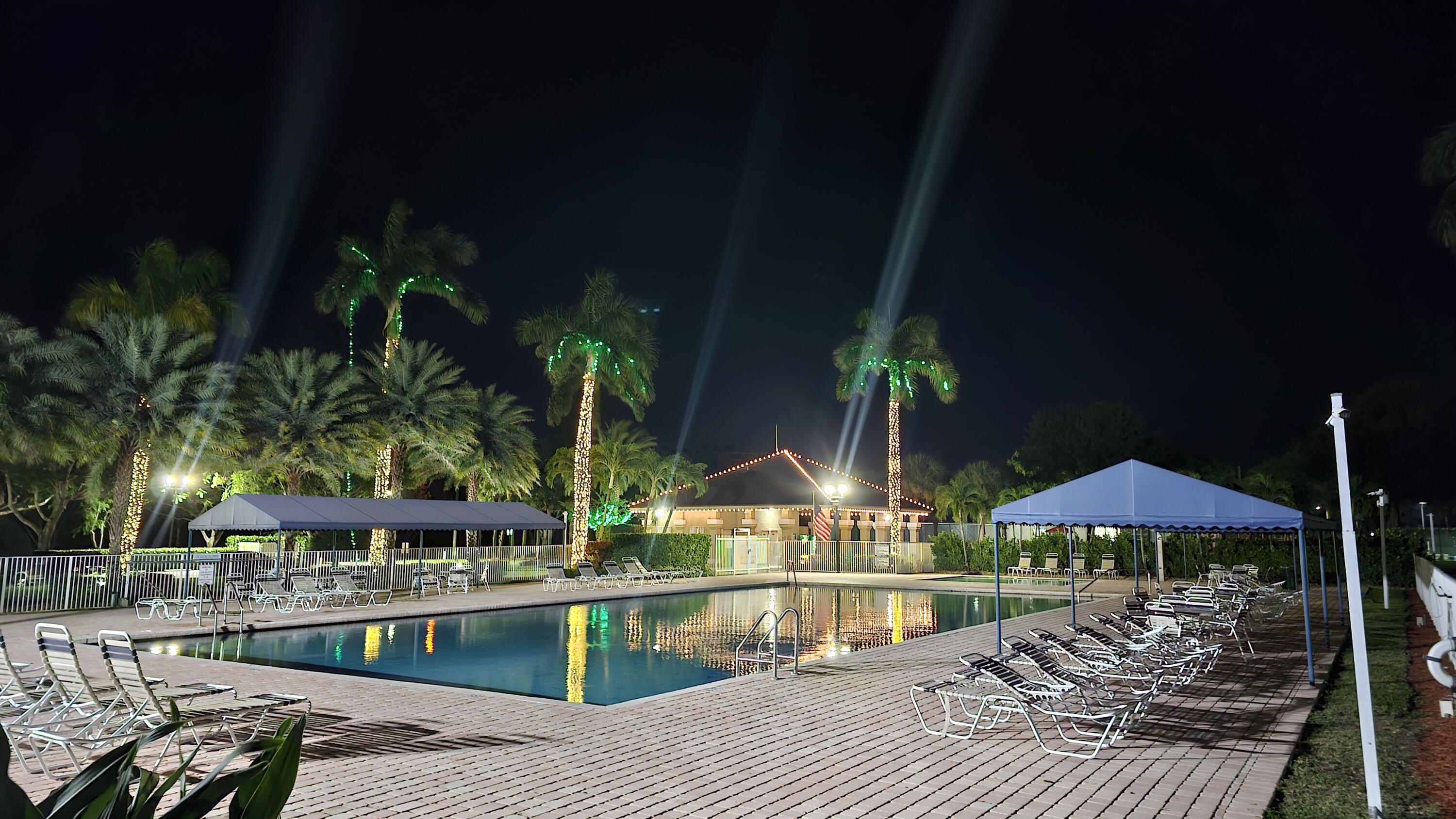 18974 Cloud Lake Circle Boca Raton, FL 33496 - Photo 26 of 29 a view of a house with yard and sitting area