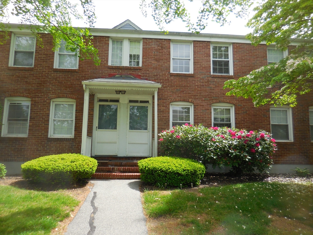 6 Colony Road, Unit 6 West Springfield, MA 01089 - Photo 1 of 17 a front view of a house with garden