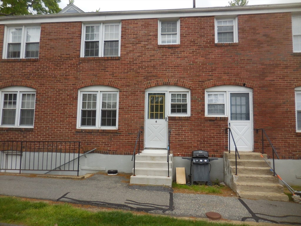6 Colony Road, Unit 6 West Springfield, MA 01089 - Photo 3 of 17 a front view of a house with a yard