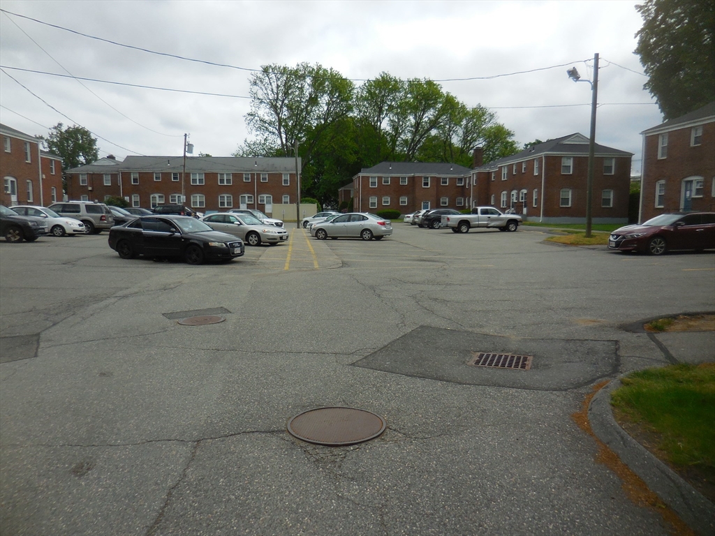 6 Colony Road, Unit 6 West Springfield, MA 01089 - Photo 5 of 17 a view of road with cars