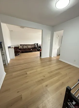a view of a room with natural light