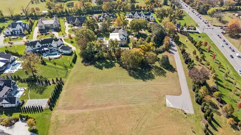 a view of swimming pool from a balcony