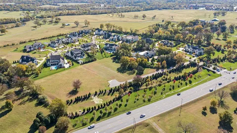 an aerial view of a city with houses