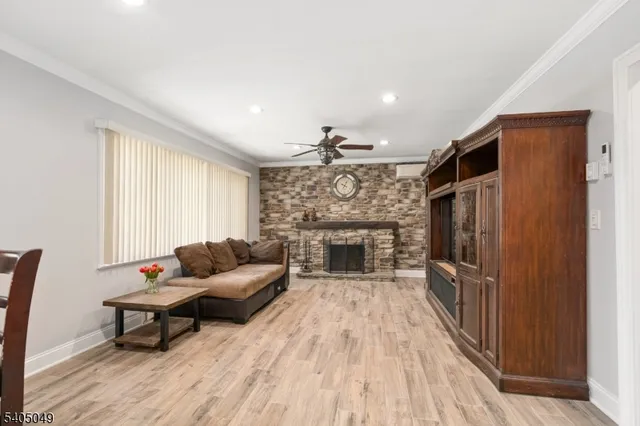 a kitchen with stainless steel appliances granite countertop a stove top oven microwave and cabinets