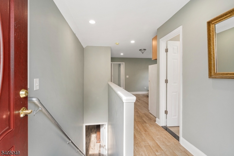 148 Highway 94 Vernon, NJ 07462 - Photo 16 of 33 a view of a hallway with an entryway and staircase