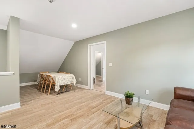 a kitchen with stainless steel appliances granite countertop a refrigerator sink and cabinets