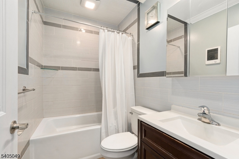 148 Highway 94 Vernon, NJ 07462 - Photo 25 of 33 a bathroom with a sink toilet and shower