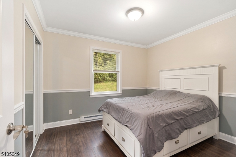 148 Highway 94 Vernon, NJ 07462 - Photo 27 of 33 a bedroom with a bed and a window