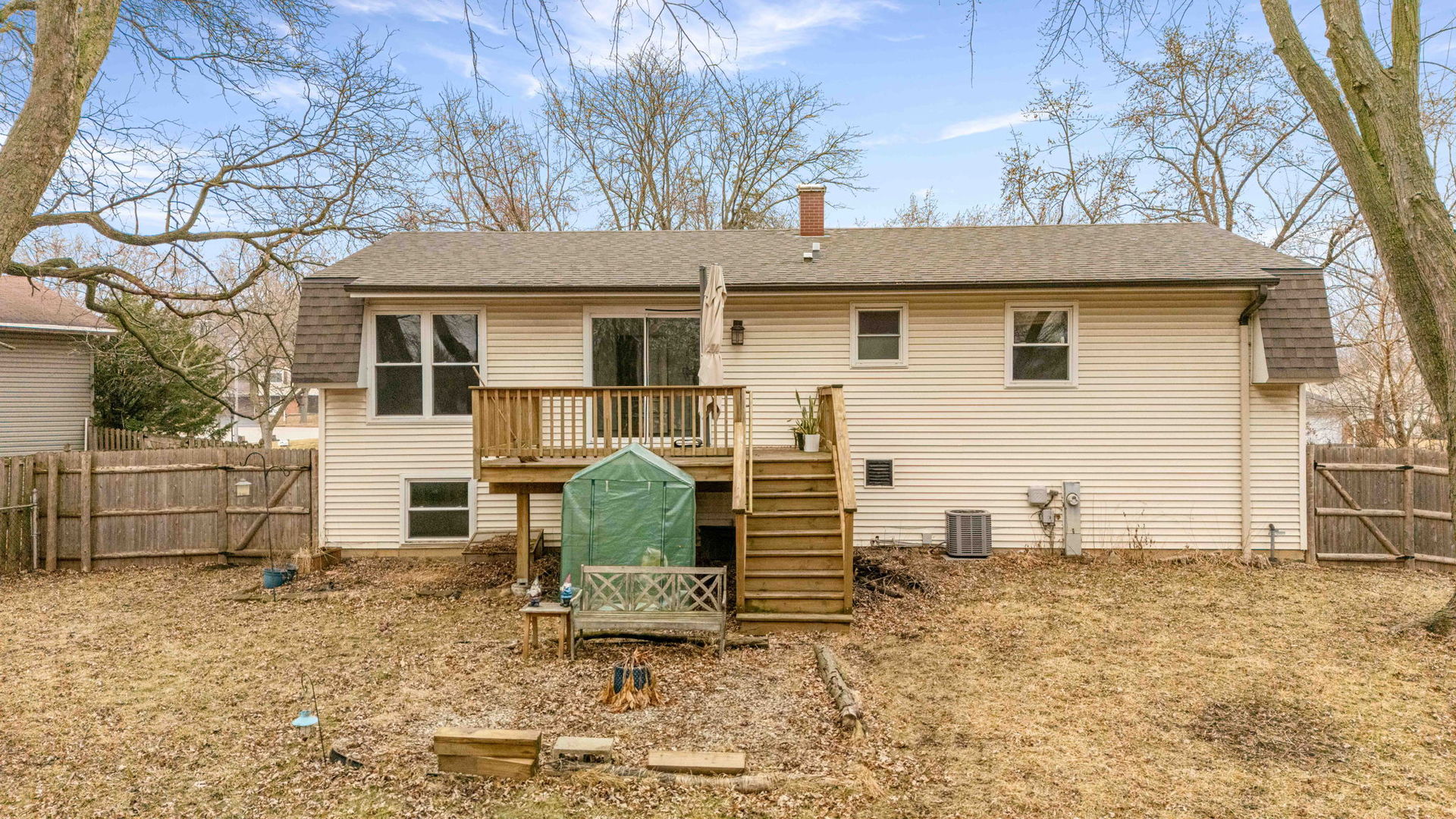 411 Assembly Drive Bolingbrook, IL 60440 - Photo 3 of 10 a view of a house with a yard and chair