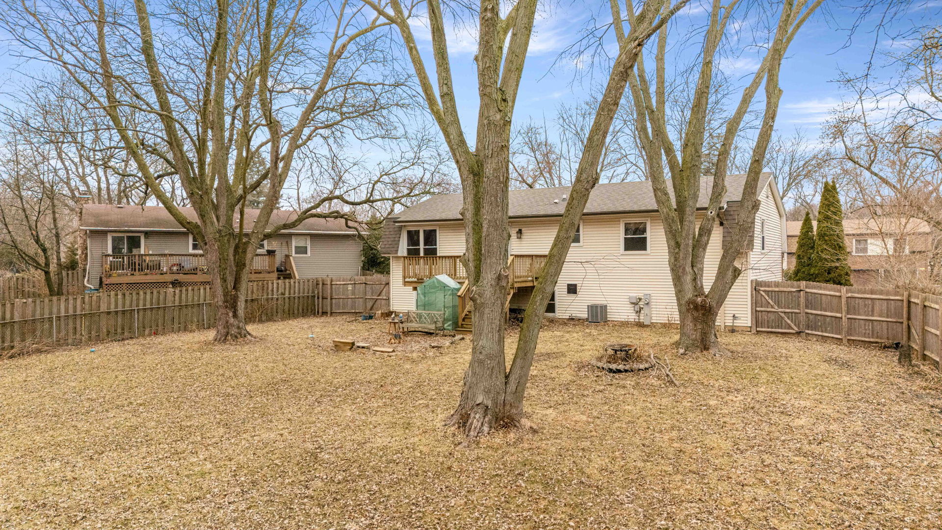 411 Assembly Drive Bolingbrook, IL 60440 - Photo 6 of 10 a view of a yard covered in snow