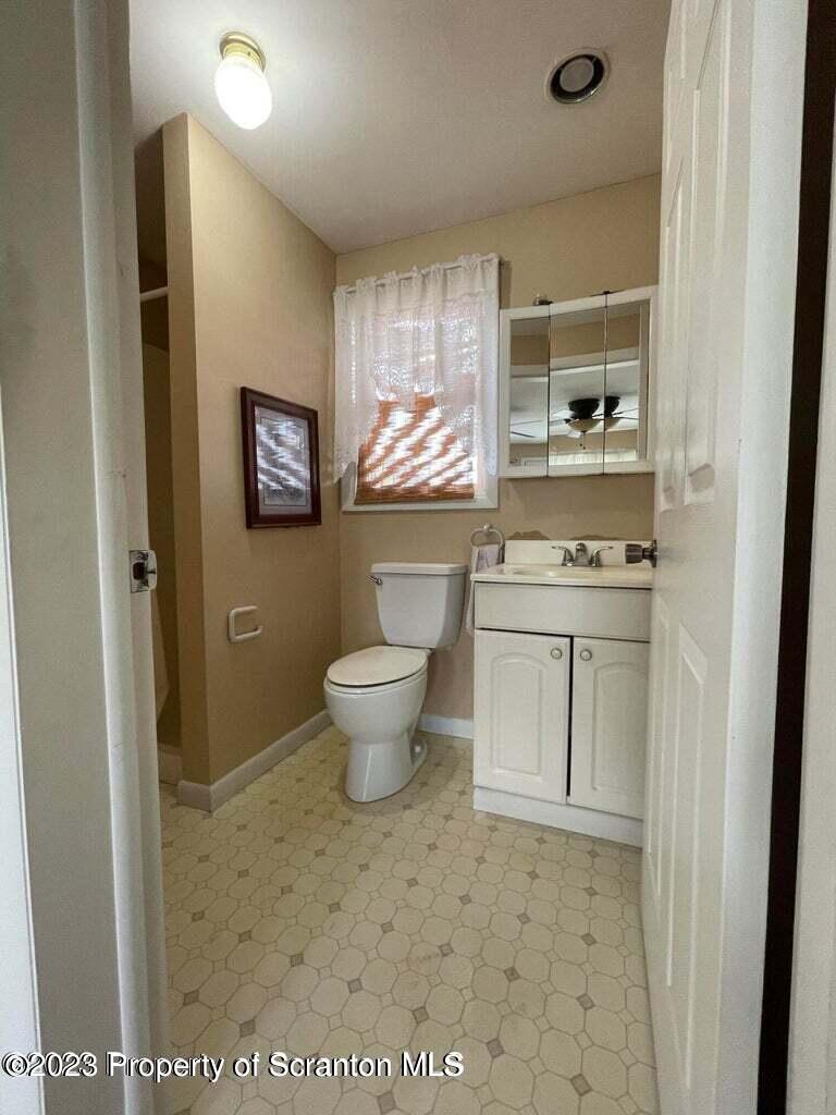 3511-3513 Winfield Avenue Moosic, PA 18507 - Photo 16 of 23 a room with stainless steel appliances a stove a sink and a refrigerator