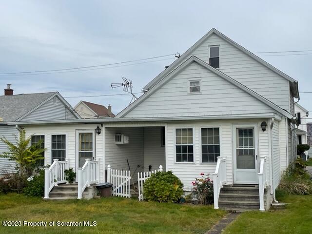 3511-3513 Winfield Avenue Moosic, PA 18507 - Photo 23 of 23 a view of a house with a yard