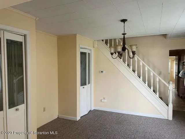 a view of hallway with stairs