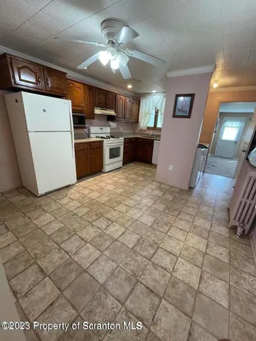 a view of a kitchen with a sink