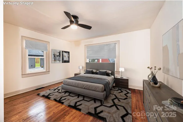 a bedroom with furniture and a window