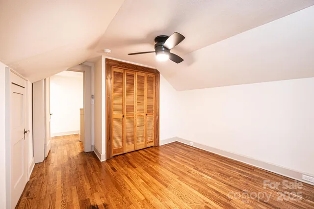 a bathroom with a sink a mirror and a shower