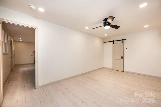 a view of a house with backyard and garden