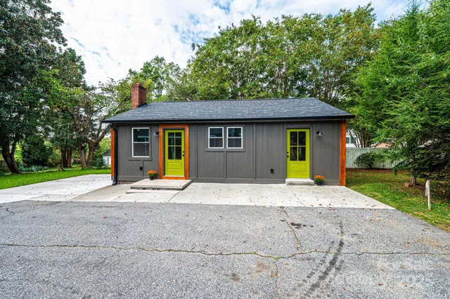 a house with trees in the background