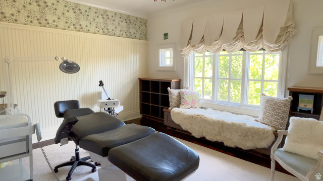 426 West Center Street Parowan, UT 84761 - Photo 46 of 107 Room featuring a broad bay window with a built-in window seat, beadboard wall paneling, and decorative wallpaper border