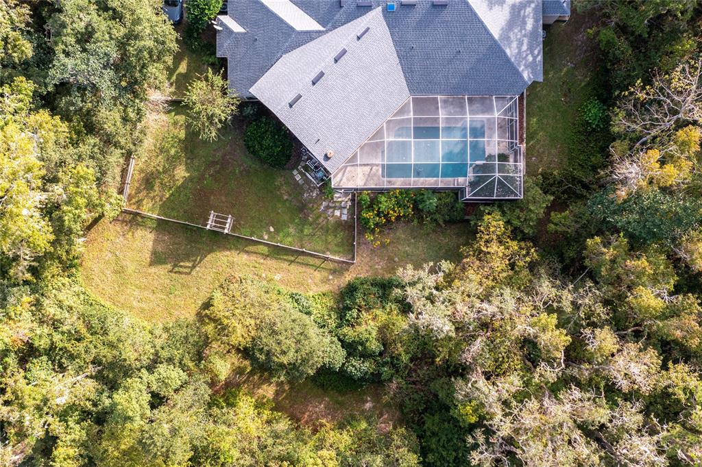 11616 Southwest 6th Lane Gainesville, FL 32607 - Photo 61 of 67 an aerial view of residential house with pool and yard