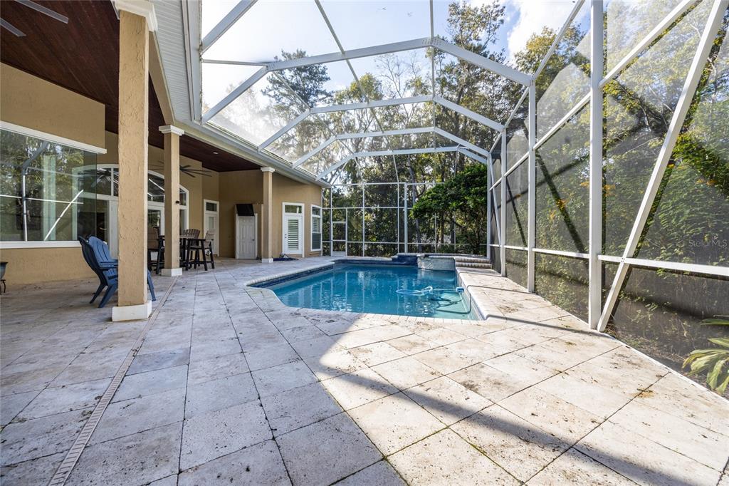 11616 Southwest 6th Lane Gainesville, FL 32607 - Photo 66 of 67 a view of a swimming pool with a patio