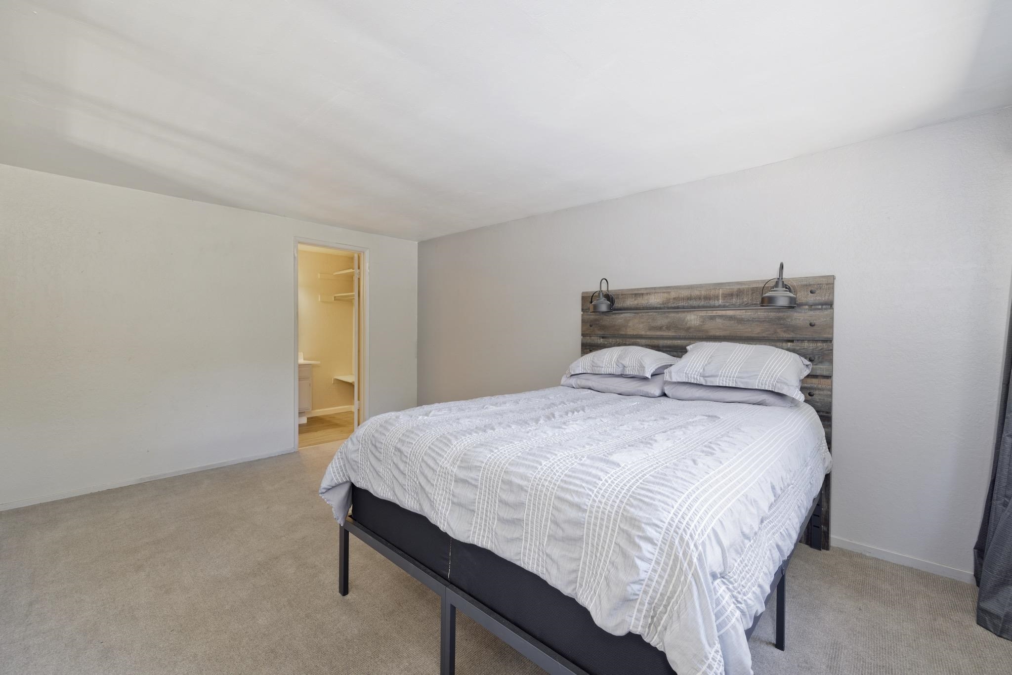 2289 Sierra Nevada Road, Unit G10 Mammoth Lakes, CA 93546 - Photo 15 of 23 Bedroom with light colored carpet and baseboards